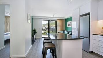 Apartment, 2 Bedrooms | Private kitchen | Espresso maker, electric kettle, toaster, kitchen islands
