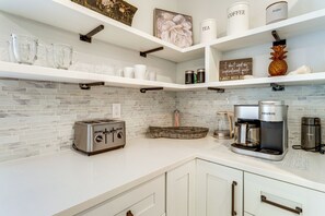 Fridge, microwave, stovetop, dishwasher - Walk to Wabasso Beach: Home w/ Hot Tub & Bikes (Vero Beach)