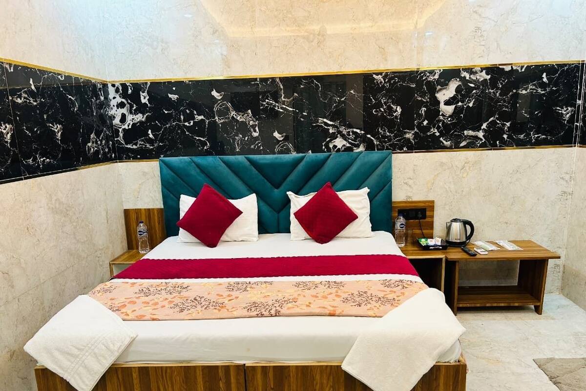 Superior driepersoonskamer | Luxe beddengoed, donzen dekbedden, bedden met traagschuimmatras