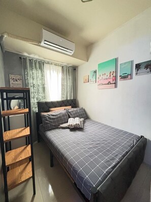 1 chambre, fer et planche à repasser, draps fournis