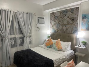 مكواة/لوح كي وملاءات أسرّة