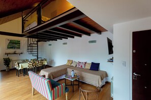 Apartment, 2 Bedrooms, Balcony, Mountain View | Living area | 43-inch Smart TV with cable channels, Netflix, streaming services