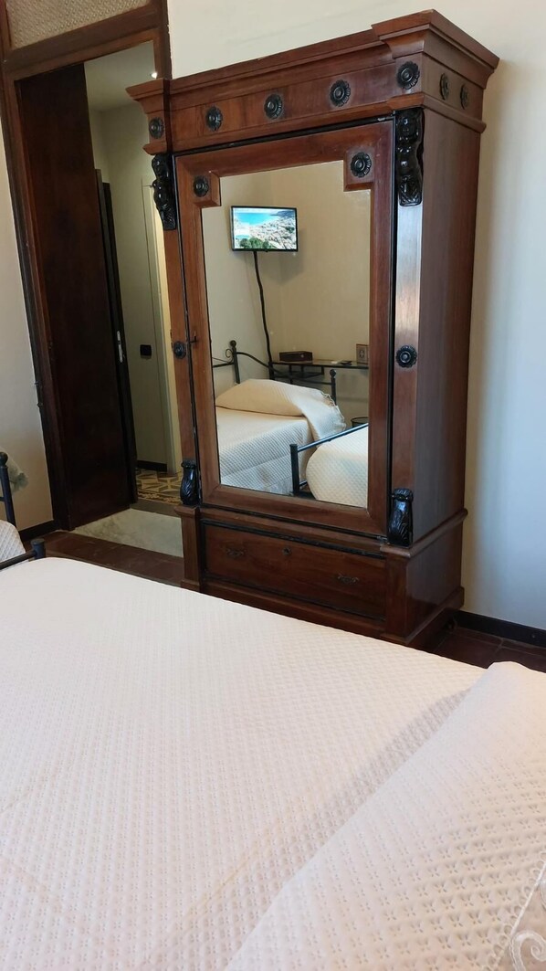 Individually decorated, desk, laptop workspace, iron/ironing board