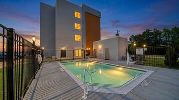 Seasonal outdoor pool, open 10:00 AM to 10:00 PM, sun loungers