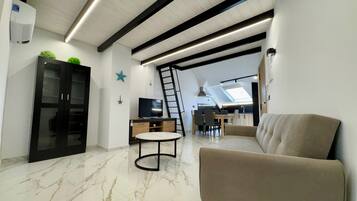 Apartament familiar, vistes a la ciutat | Sala d'estar