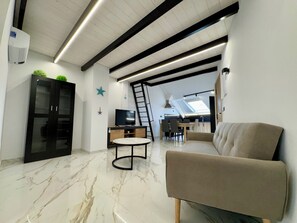 Apartamento familiar, vistas a la ciudad | Zona de estar