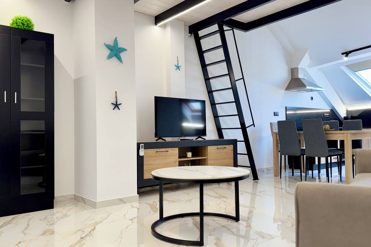 Apartamento familiar, vistas a la ciudad | Zona de estar