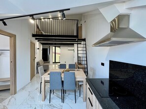 Apartamento familiar, vistas a la ciudad | Comedor