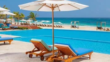 Private beach, white sand, beach cabanas, sun-loungers