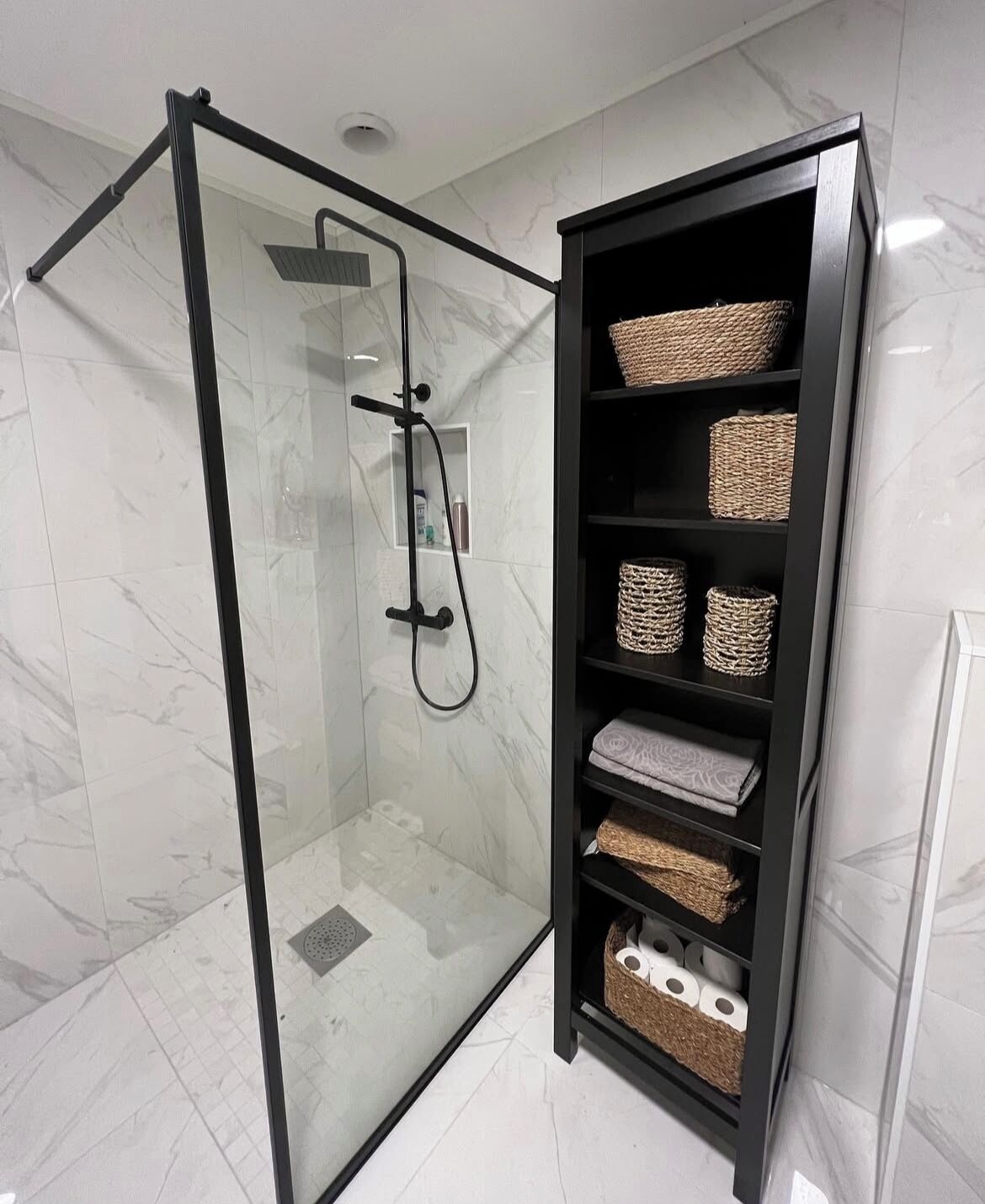 Shower, hair dryer, towels, toilet paper