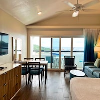 Queen Studio with Sofa Bed at Hilltop Villas III | Living area | Flat-screen TV