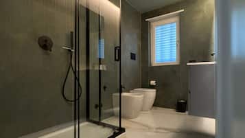 Shower, hair dryer, bathrobes, towels