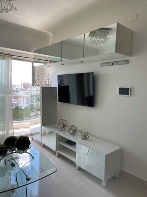 Appartamento Deluxe, balcone, vista città | Area soggiorno