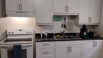 Een magnetron, een oven, een kookplaat