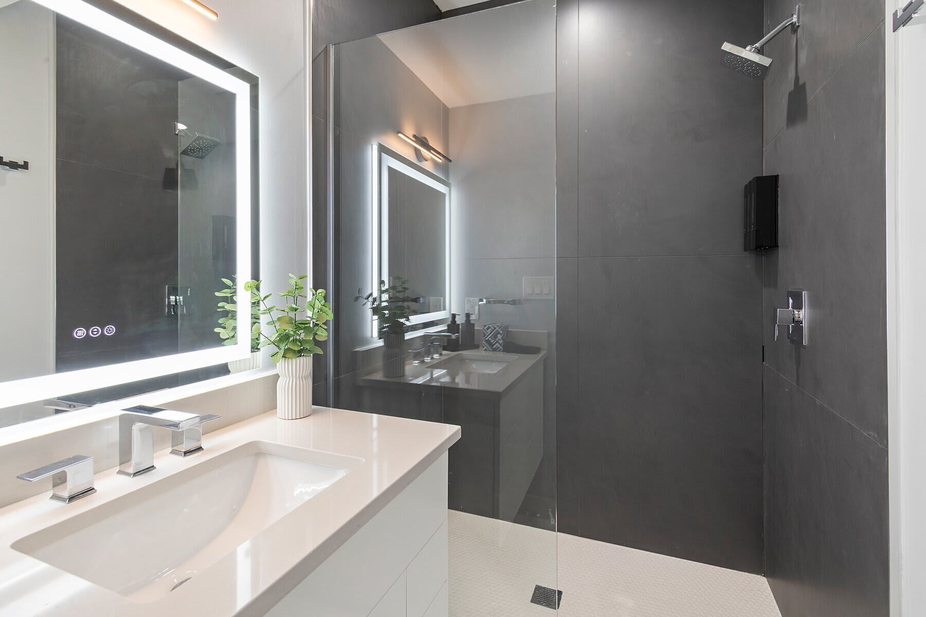 Shower, hair dryer, towels, shampoo