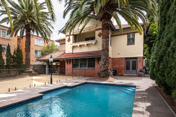 Large secure yard with solar heated pool