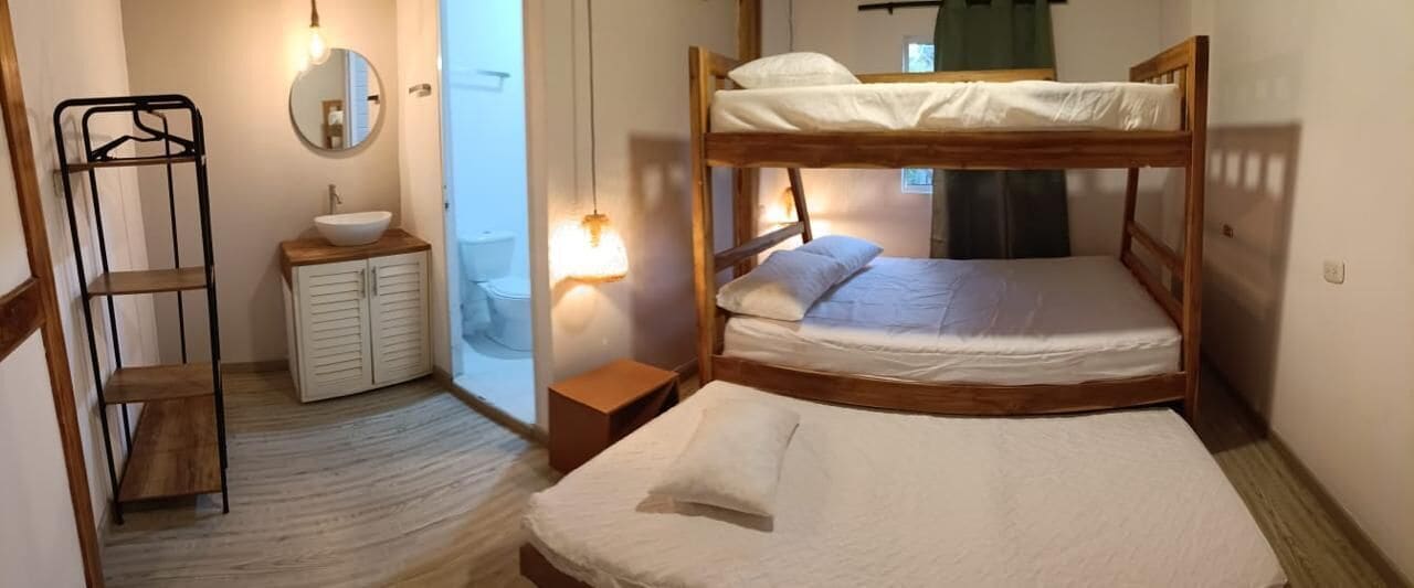 Habitación cuádruple | Ropa de cama 