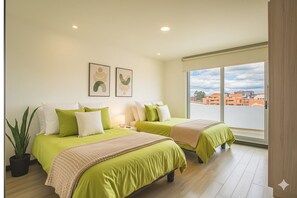 3 عدّة غرف نوم ومكواة/لوح كي وخدمة الإنترنت وملاءات أسرّة