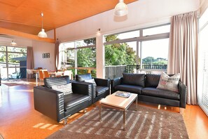 Luxury House, 2 Bedrooms, Garden View | Living area | 45-inch LCD TV with satellite channels, fireplace, DVD player - Riverside Matakana (Matakana)