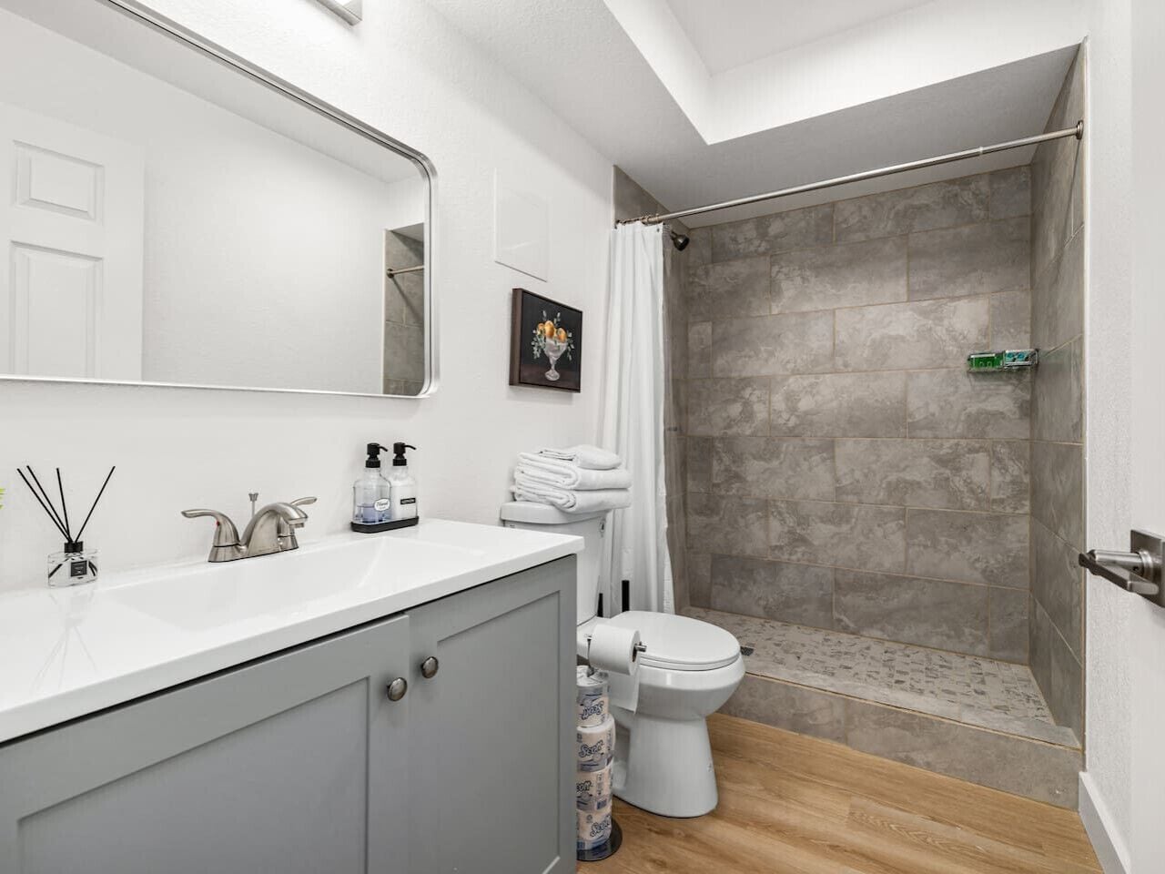 Shower, hair dryer, towels