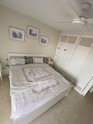 1 bedroom, desk, iron/ironing board, travel cot