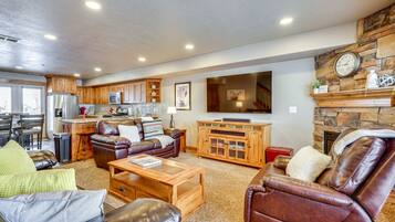 TV, fireplace, books, stereo