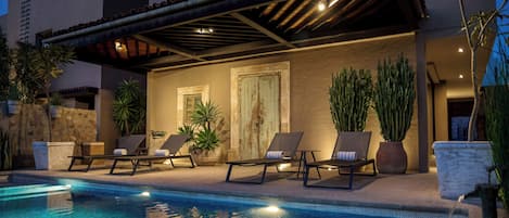 Outdoor pool, open 8:00 AM to 8:00 PM, free cabanas