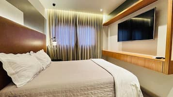 Gallery Apartment | Desk, laptop workspace, blackout curtains, iron/ironing board