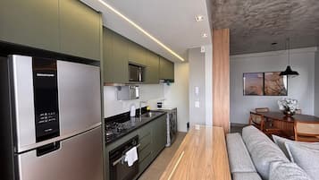 Apartment | Private kitchen | Full-sized fridge, microwave, oven, stovetop