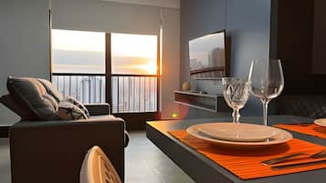 Comfort Apartment | Living area | 40-inch Smart TV with digital channels, pay movies