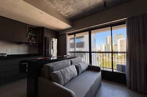 Luxury Apartment | Living area | 40-inch Smart TV with digital channels, pay movies