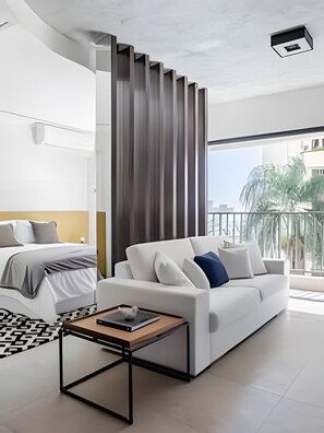 Comfort Apartment | Living area | 40-inch Smart TV with digital channels, pay movies