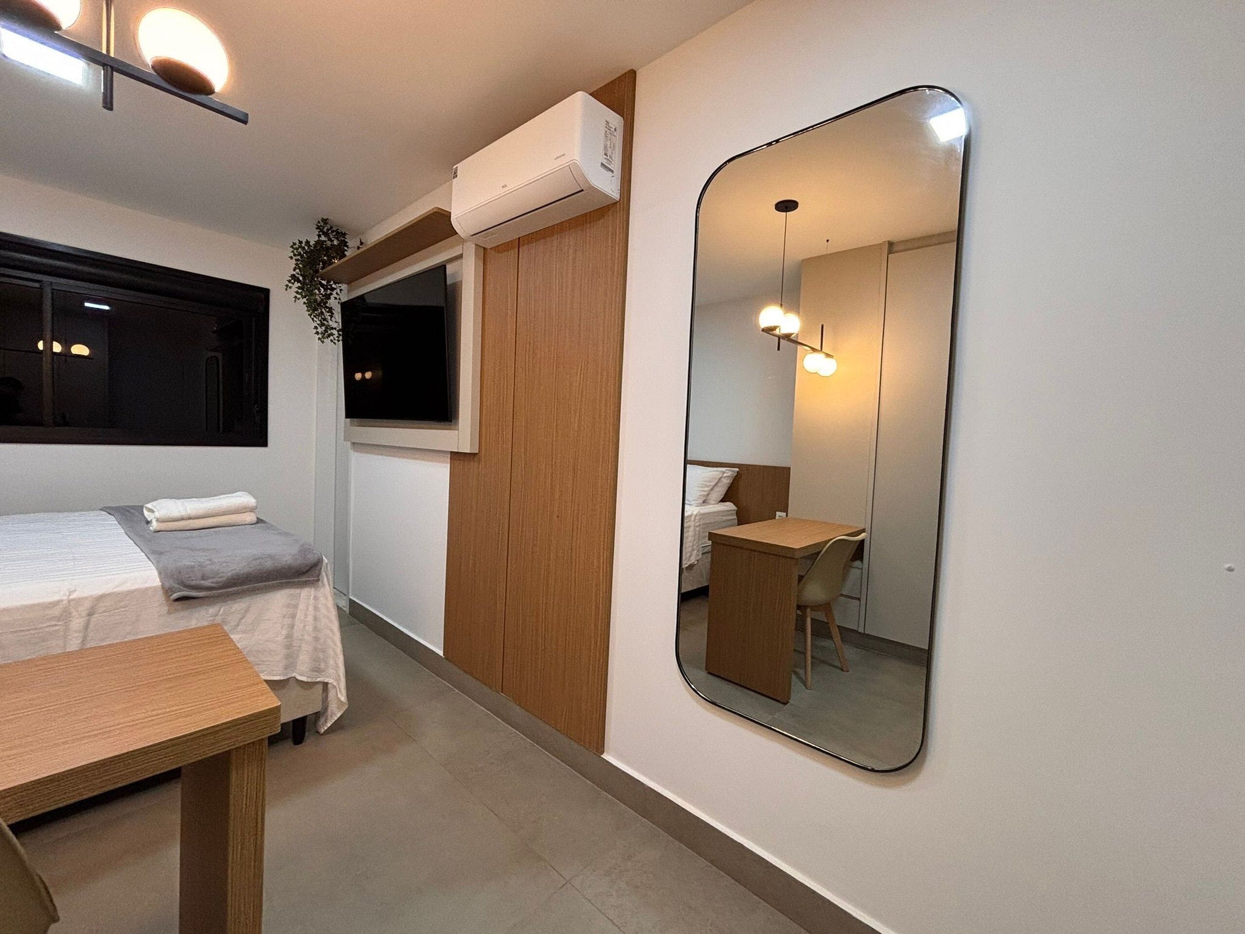 Grand Apartment | Desk, laptop workspace, blackout drapes, iron/ironing board