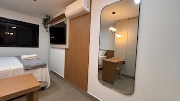 Grand Apartment | Desk, laptop workspace, blackout drapes, iron/ironing board