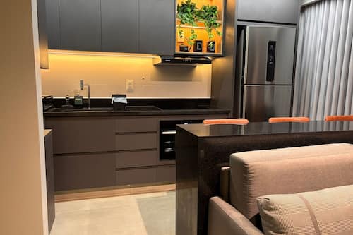 Luxury Apartment | Private kitchen | Full-size fridge, microwave, stovetop, cookware/dishes/utensils