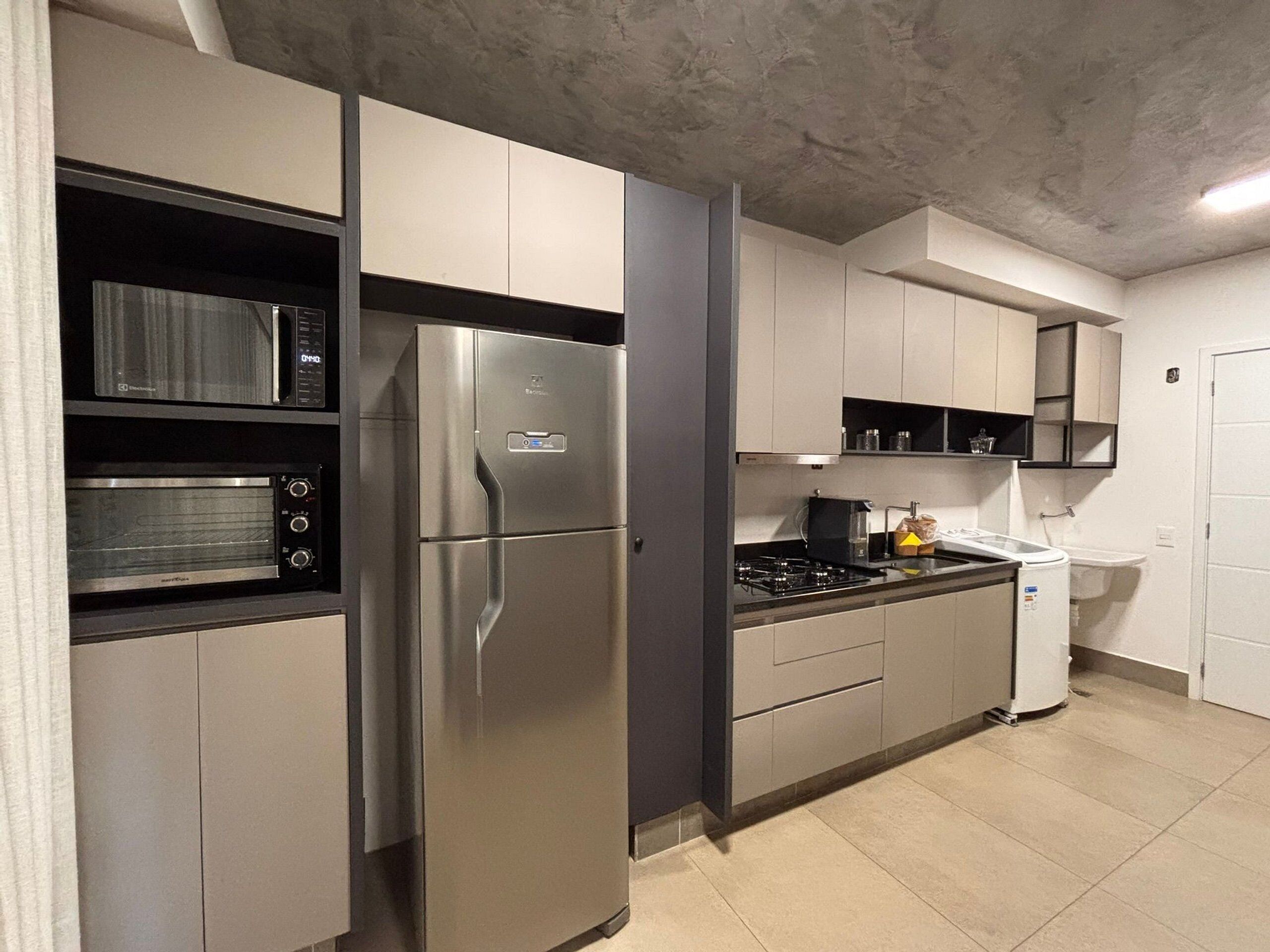 Design Apartment | Private kitchen | Full-size fridge, microwave, stovetop, cookware/dishes/utensils