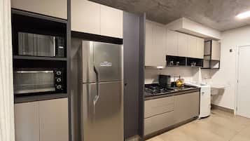 Design Apartment | Private kitchen | Full-size fridge, microwave, stovetop, cookware/dishes/utensils