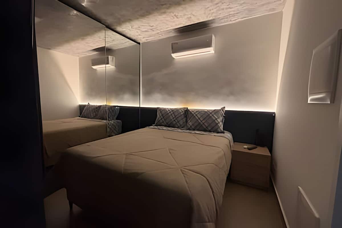 Desk, laptop workspace, blackout curtains, soundproofing