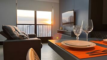 Comfort Apartment | Living area | 40-inch Smart TV with digital channels, pay movies