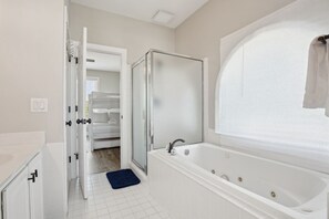 Jetted tub, hair dryer, towels, soap