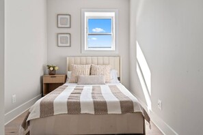 2 bedrooms, desk, iron/ironing board, travel crib