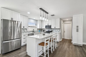 Fridge, microwave, oven, stovetop - Coastal Family Retreat – Heated Pool, Fire Pit & Fun! (Holiday)