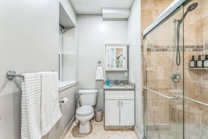 Shower, hair dryer, towels, soap