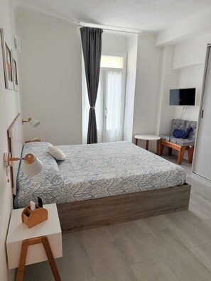 1 slaapkamer, een strijkplank/strijkijzer, wifi, beddengoed