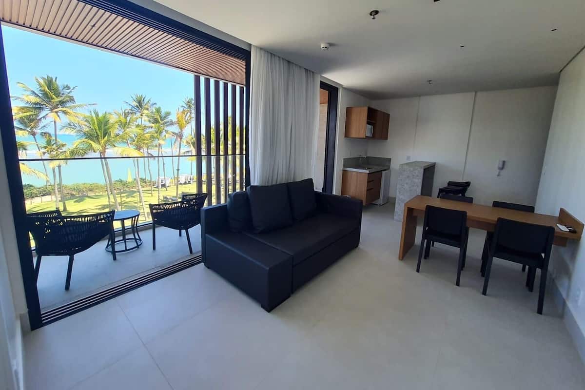 Familien-Vierbettzimmer, am Strand | Wohnbereich