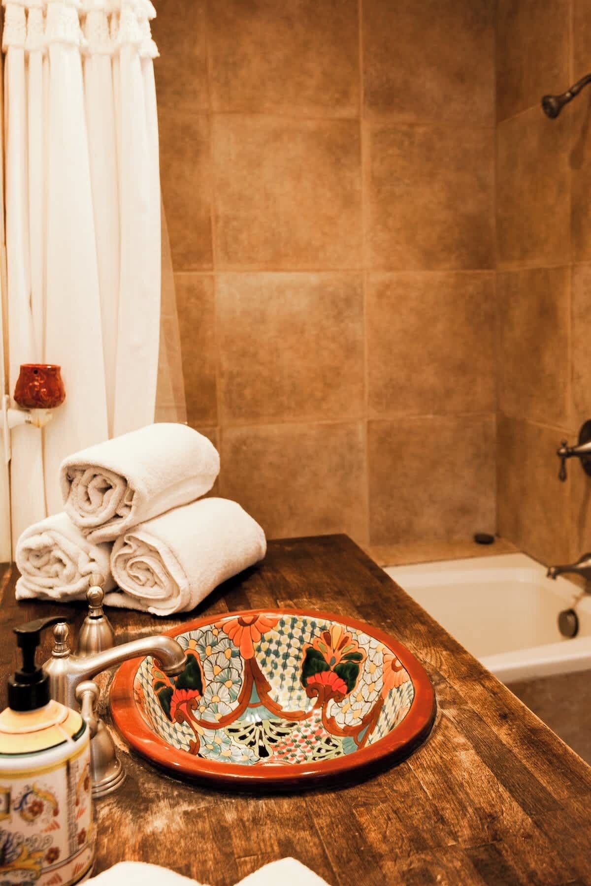 Jetted bath, hair dryer, towels, soap