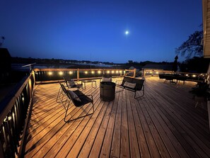 Terrace/patio - Brand new Modern, 6 bedroom waterfront home on a beautiful Long Lake. (Campbellsport)