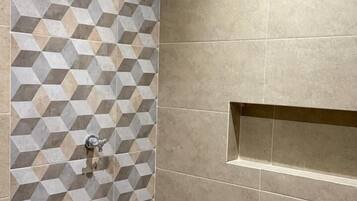 Shower, towels, soap, toilet paper