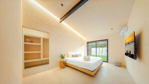 Un dormitorio moderno con cama, estanterías empotradas, una planta en maceta y un ventanal grande.