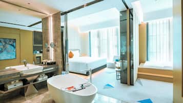 Premium bedding, down comforters, minibar, in-room safe